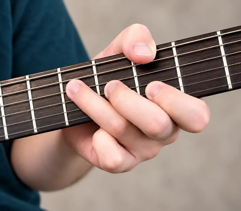 Jimi Hendrix thumb-over akkoordtechniek op gitaar