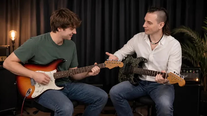Wouter Baustein met gitaar voor privé gitaarles voor Leuven en omgeving